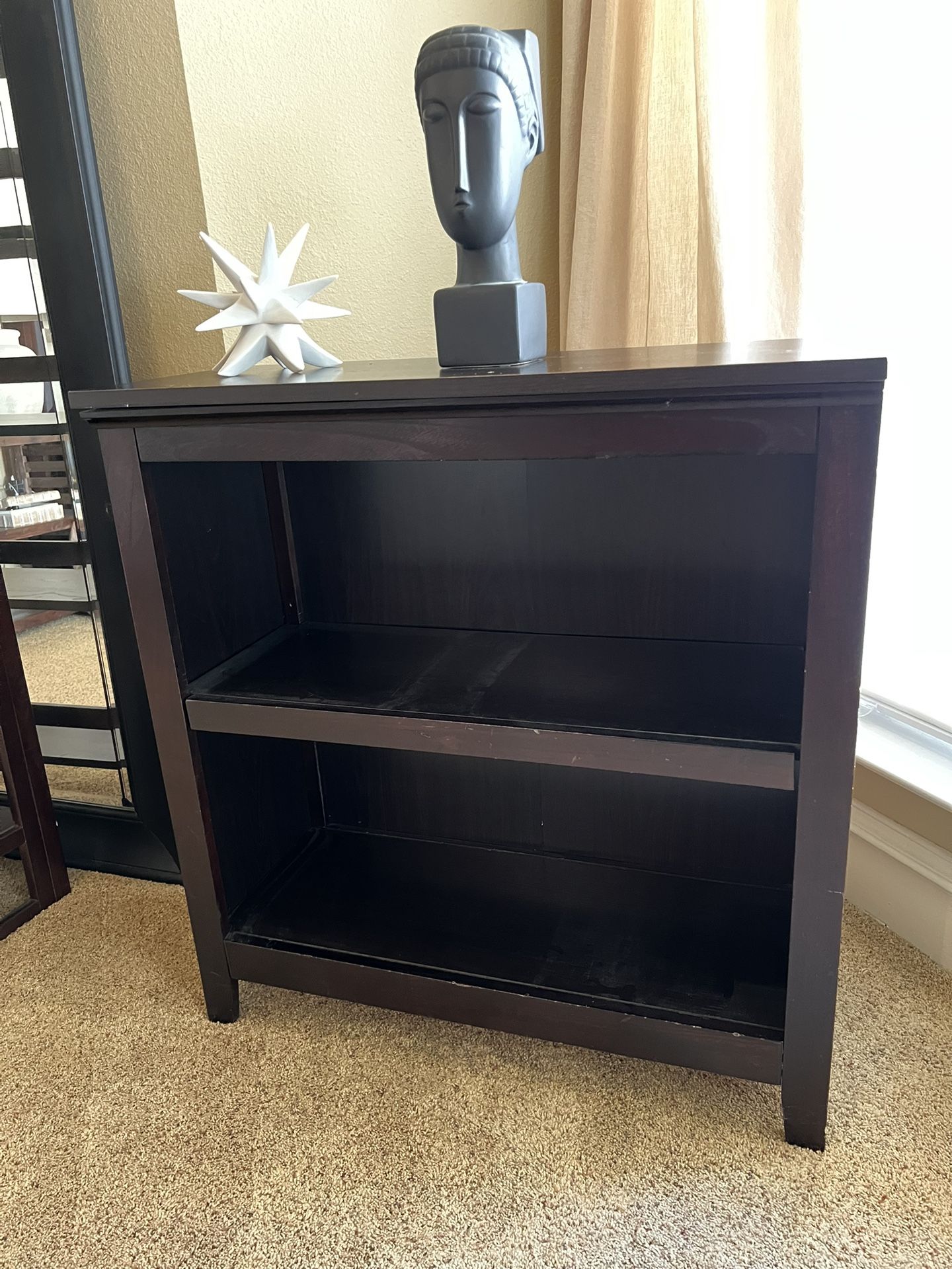 Bookcase • Large Mirror • Textured decor 