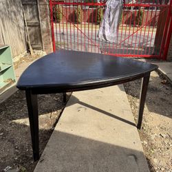 Uniquely Shaped Black Dining Table 