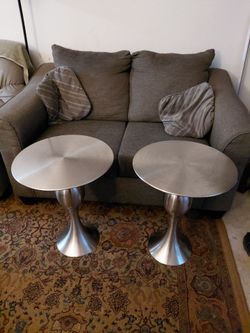 Set of 2 stainless steel round tables
