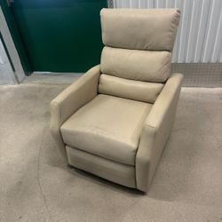 Beige Leather rocking chair, reclines and swivels .   31”’wide , 30” depth , 19” to seat, 40” to top of chair  $100