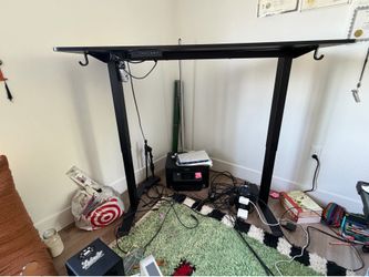 Black height adjustable desk