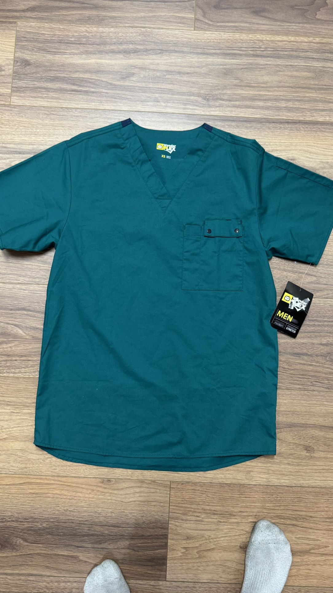 Men’s scrubs size small teal blue color new with tags