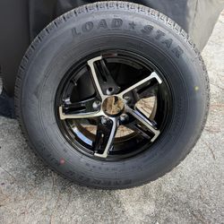 New 205-75-14inch Trailer Tires With Black Aluminum Rims.  