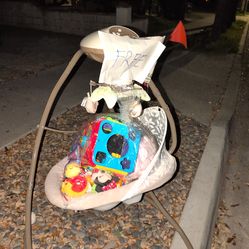 Electric swing and toys for babies.