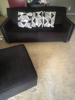 Black Sofa with Ottoman and Nailhead Trim