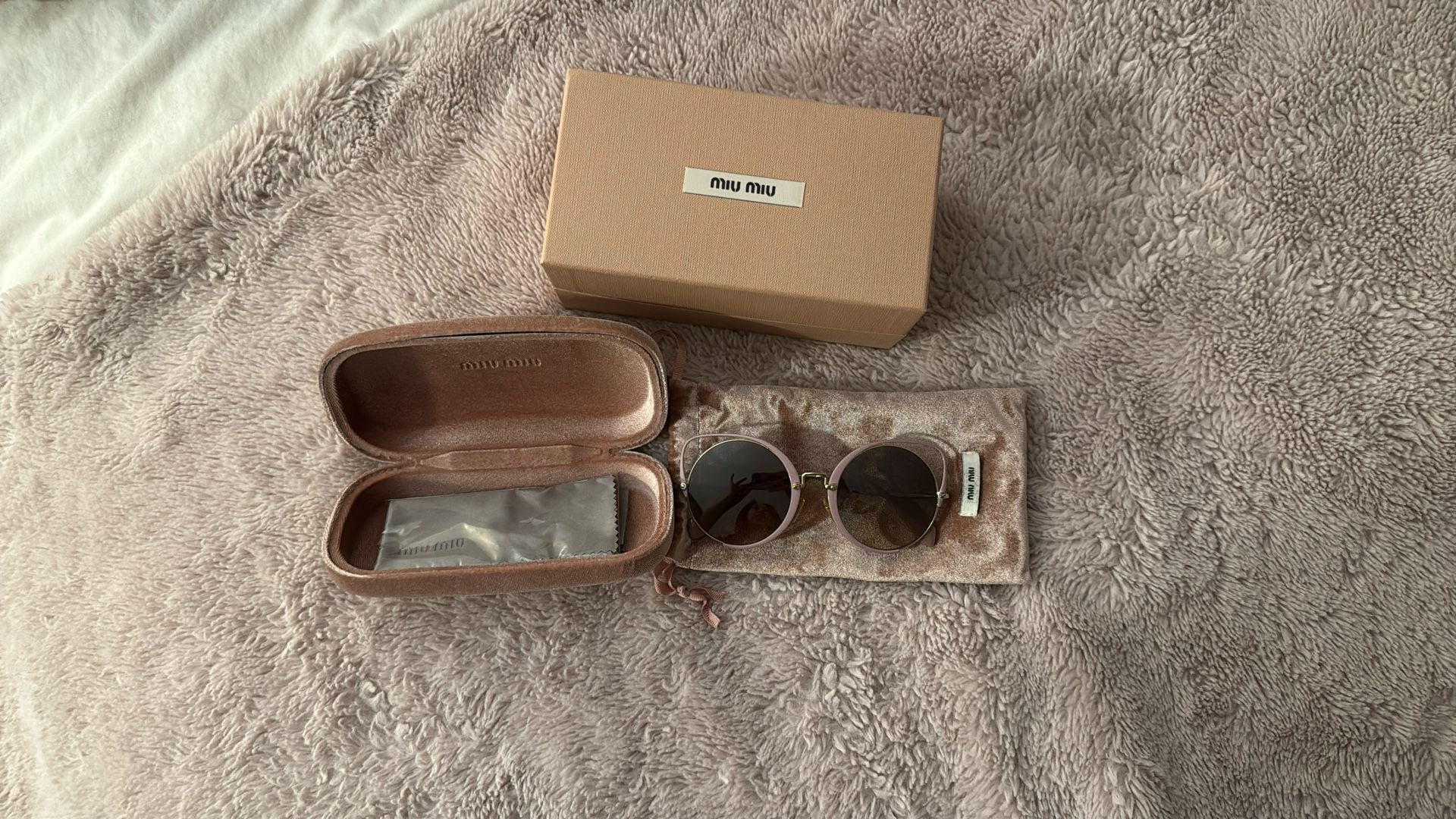 Miu Miu Cat Eye Sunglasses