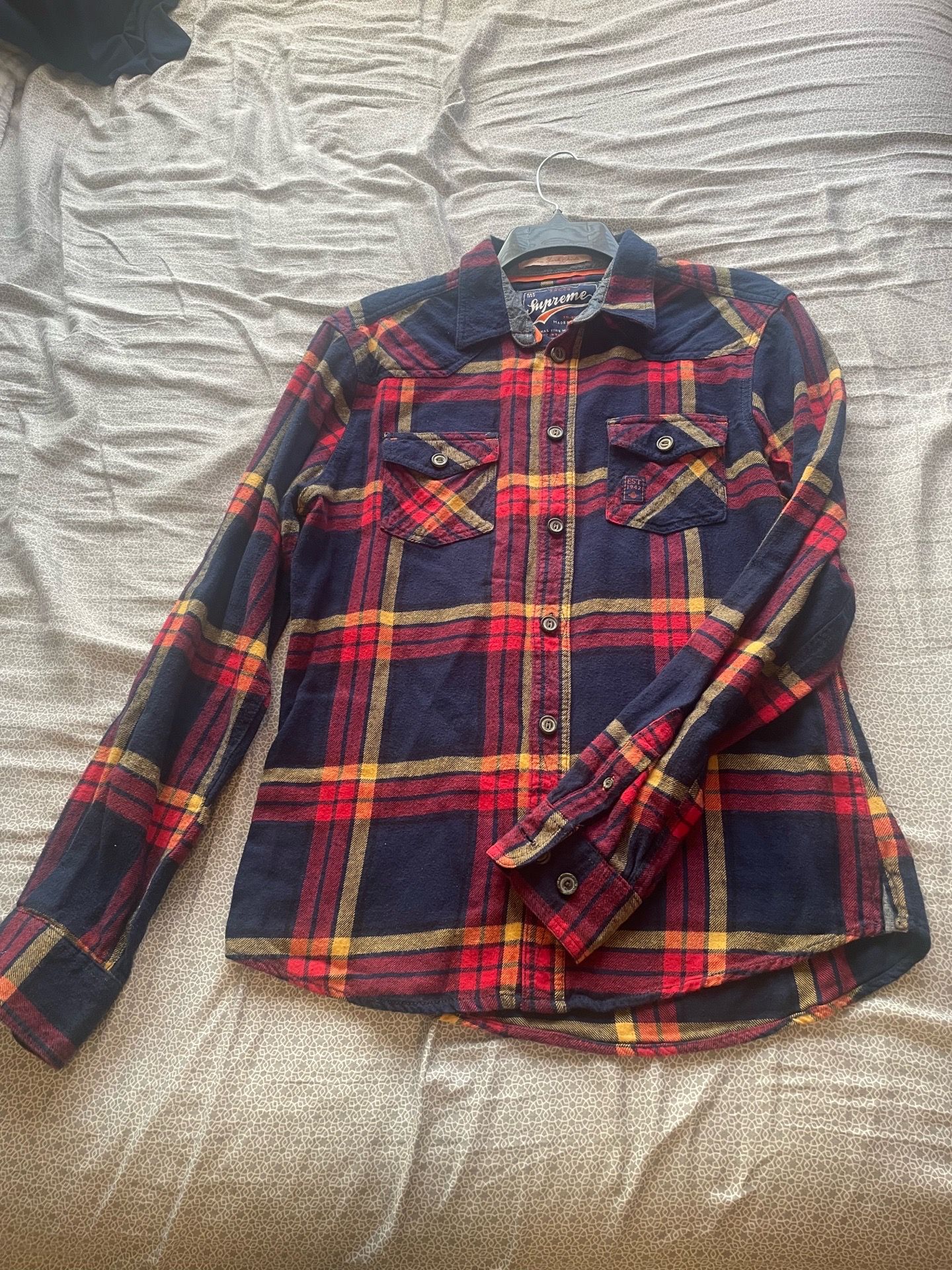 Long sleeve button-up flannel shirt