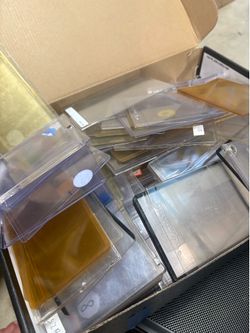 Used sports cards cases - old, yellowed, screw down for baseball cards