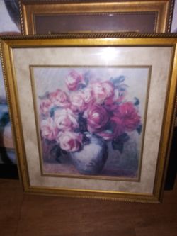 2 picture frames of flowers