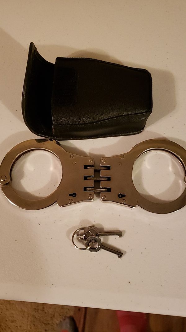 Real handcuffs w/2 keys & a case for Sale in Denison, TX OfferUp