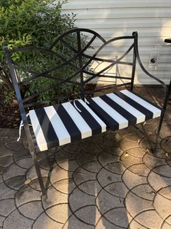 Beautiful vintage Flat black Iron Bench With Pick Of Cushions 