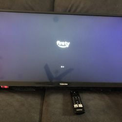 32 Inches Toshiba Fire Stick Tv With A Hanging Bracket 