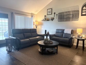 Leather Reclining Sofa and Loveseat