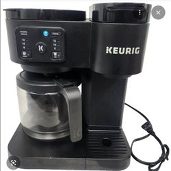 KEURIG COFFEE MACHINE..12 OZ COFFEE POT & ICED COFFEE MAKER ..