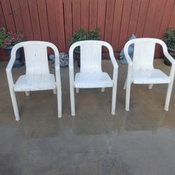 Three Plastic Chairs