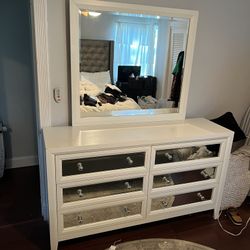 Dresser drawer with mirror finish and vanity mirror