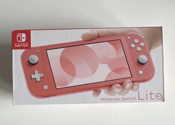NEW! Nintendo Switch 32GB Lite Coral Handheld Console and accessories included
