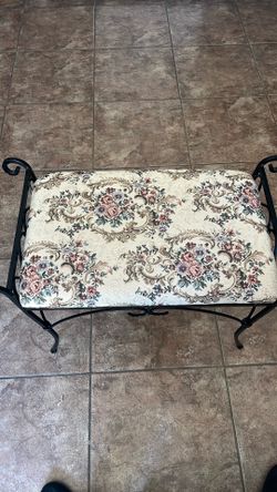 Metal bench black  Moving. !!  Come get it today - in excellent condition -27x16x20. Upholstered floral fabric.