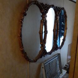 Mid Century Regency rococo style Gold syroco three Ring Wall mirror