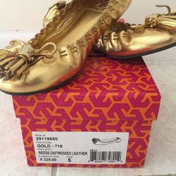 Tory burch flat gold shoes