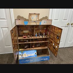 Wood pirate boat with storage on the bottom with all the figures for a perfect play for kids. 