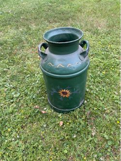 Vintage metal milk jug painted