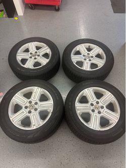 Set of 4 18” wheels with lightly used tires