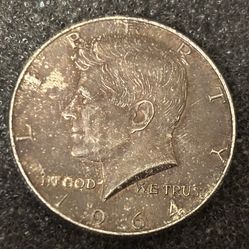 50 cents 1964. Vintage coin USA. Patina.