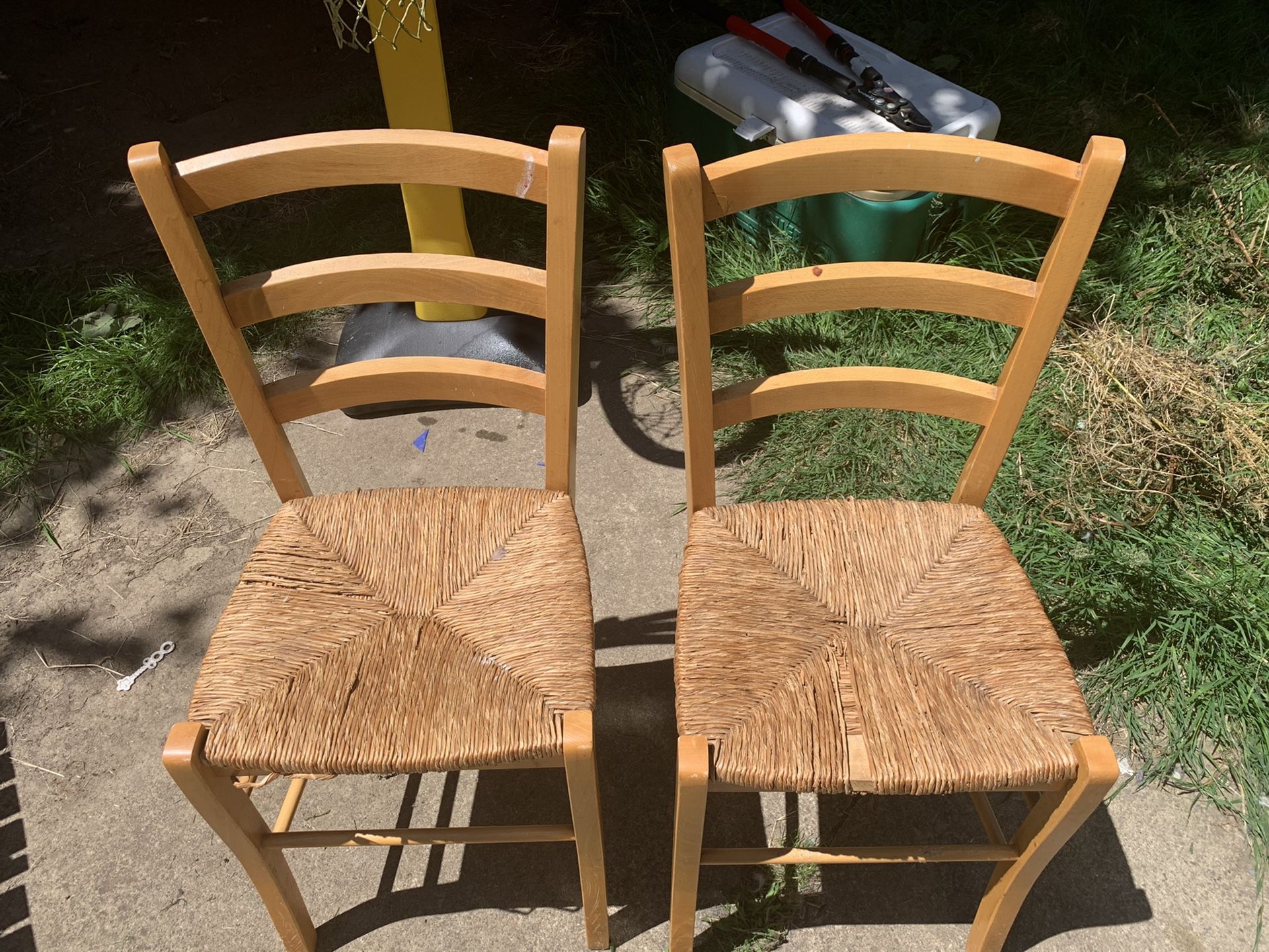 FREE Two sturdy chairs with wicker seats.