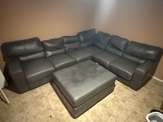 Gray Leather Sectional Sofa with Ottoman
