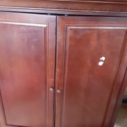 Like new entertainment stand sits together made by Stanley Furniture