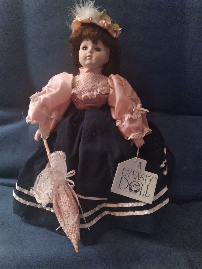 Dynasty Doll Collection a 16" Dynasty doll, she has the umbrella, and shoes