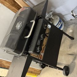 Grill With Propane Tank. 