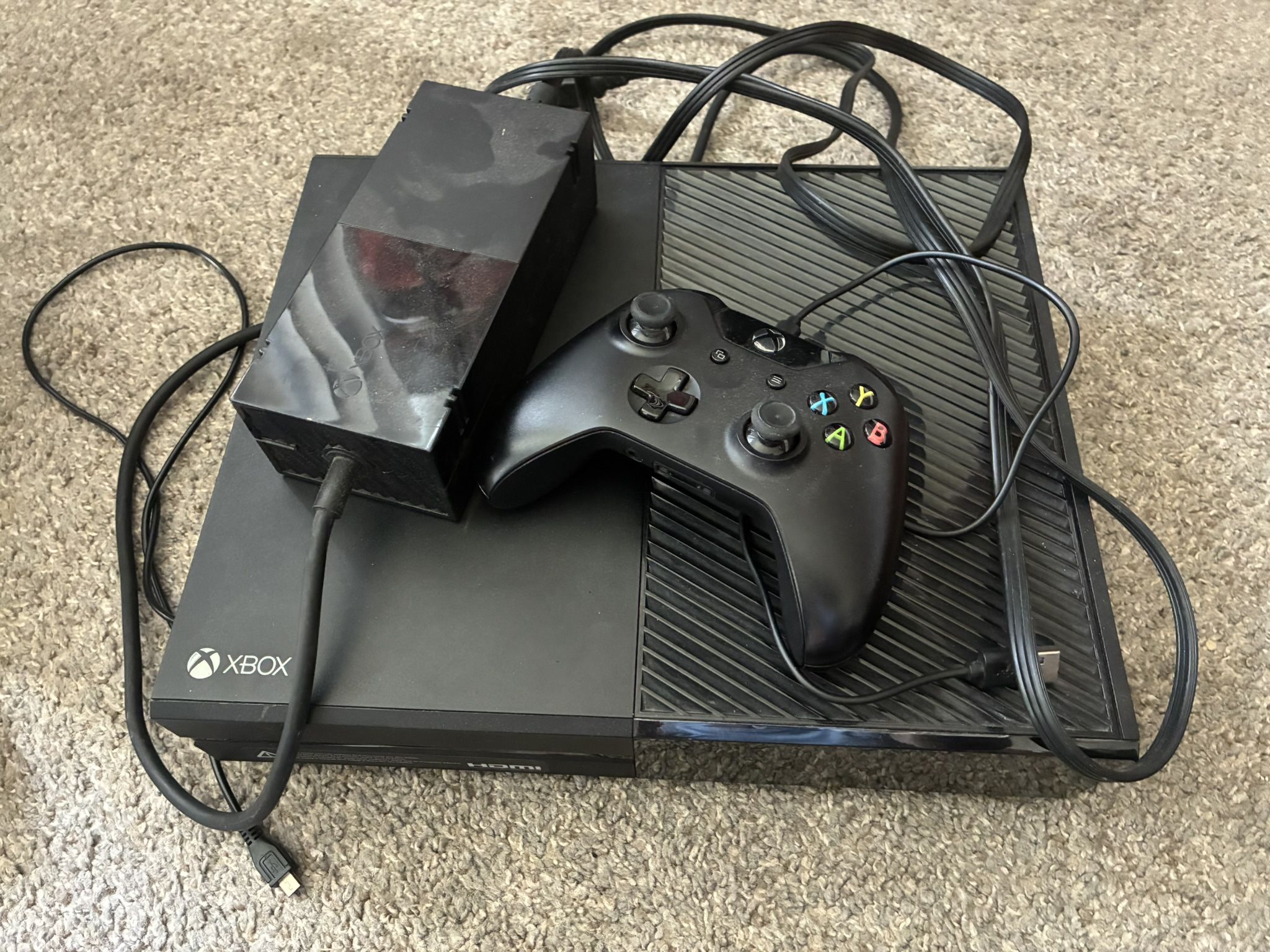 Xbox. Back Cord Missing and One Remote.