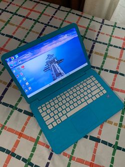14"inch Intel Celeron HP Laptop, 4GB RAM, 64GB eMMC, Inbuilt Bluetooth, SD Card Reader And a WebCam. Windows 11