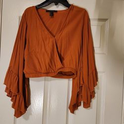 Forever 21 orange ruffle blouse with bell sleeves. Size M #boho #festival