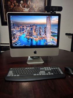 Apple iMac OS X El Capitan desktop computer with WINDOWS 10 installed.  intel Core 2 Duo CPU processor.  21 inches screen.  Good condition.  Webcam.  