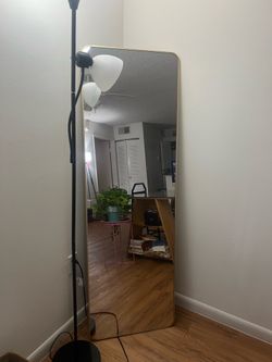 Full size mirror with golden decor