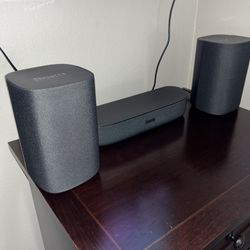 Roku Streambar and two Roku Wireless Speakers