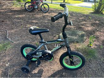 12” bike with training wheels (used)