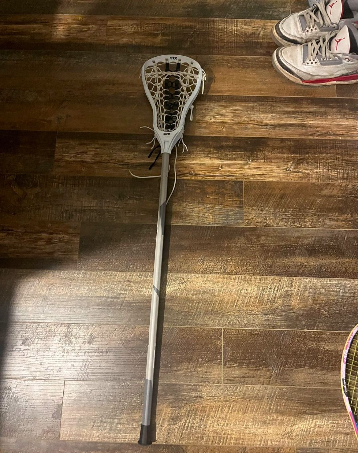 2 lacrosse sticks