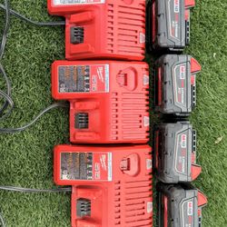4 Baterías de 5.0  Y 3 Cargadores  Milwakee 