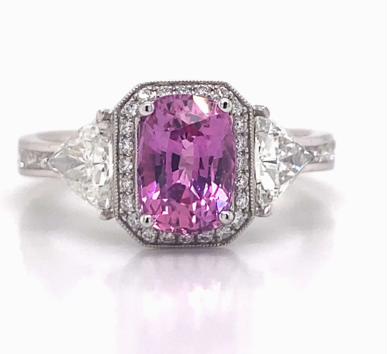 Pink Sapphire & Diamond Ring in 18K White Gold 💎🥰 A beautiful 1.57 carat cushion cut pink sapphire sits at the center of this enchanting Simon G. se