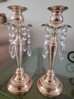 Metal and glass candle stands.