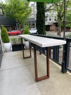 Long metal/wood bar.