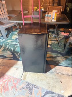 Black mini fridge with freezer