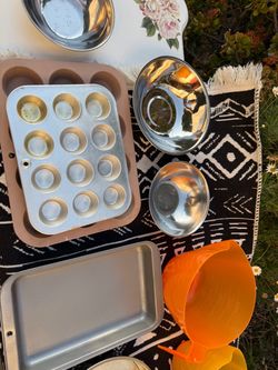 Many pieces of bakery trays and barbecue stainless steel pieces etc great condition some of them are new