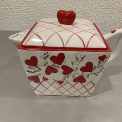 Beautiful unusual porcelain red heart , white and green tea pot , the height is about 4”  Never used , if you see it here , it is available, local pic