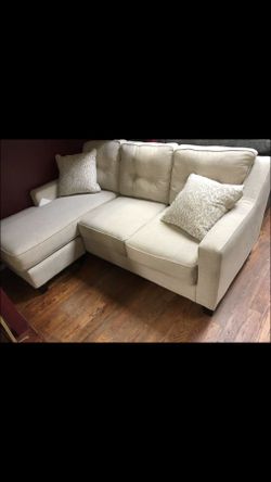BRAND NEW ASHLEY SOFA CHAISE FOR $499!!!!!