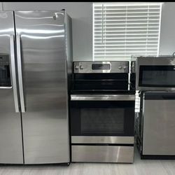Kitchen appliances plus washer and dryer with pedestals
